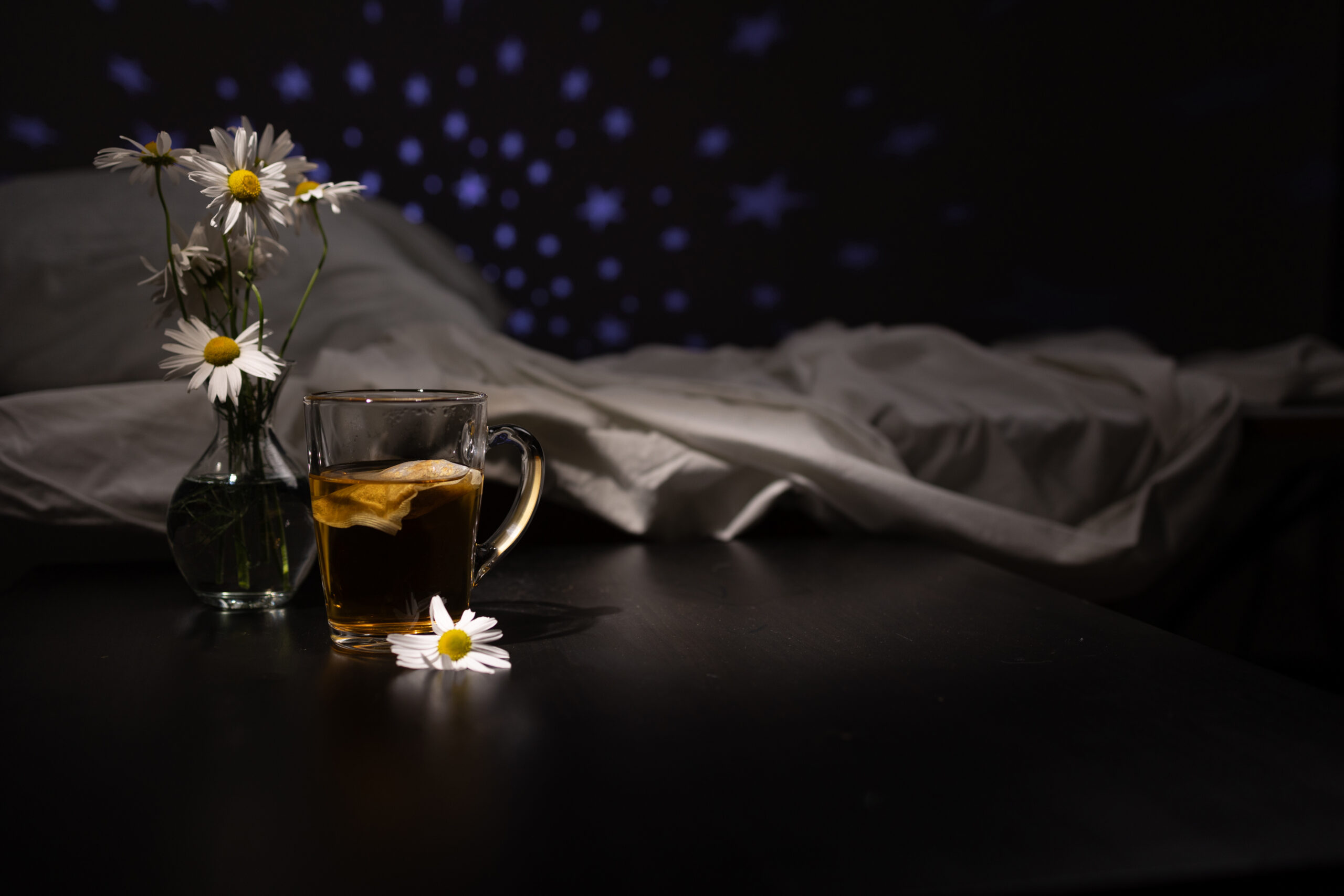 Chamomile tea at night representing natural sleep remedies that don't address anxiety-driven insomnia