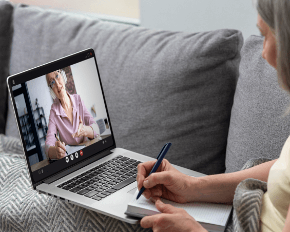 Board-certified psychiatrist discussing PTSD via telehealth (1)