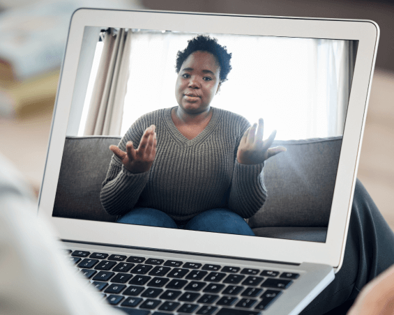 Board-certified psychiatrist discussing post-TBI recovery via video call (1)